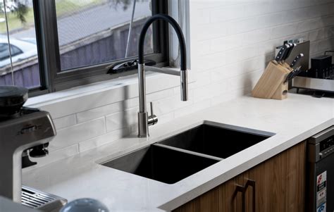 Alma kitchen - Description. Convenience and style come together with this Kohler Alma kitchen faucet. Its retractable spray head switches between spray and stream functions with just a touch, while magnetic docking ensures that it glides smoothly and secures easily into place. You'll also love its angled nozzles that provide powerful performance to help you ...